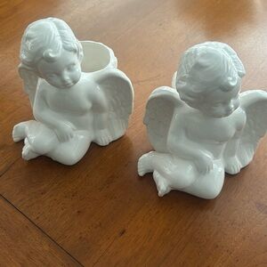 Angel candleholders. Or small plant or candies